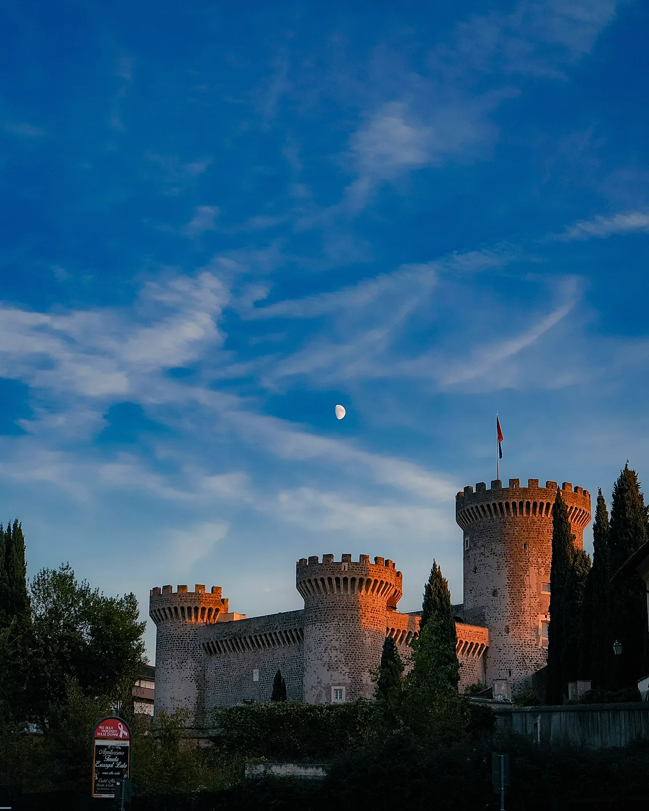 Towers of Tivoli's fortress with the moon