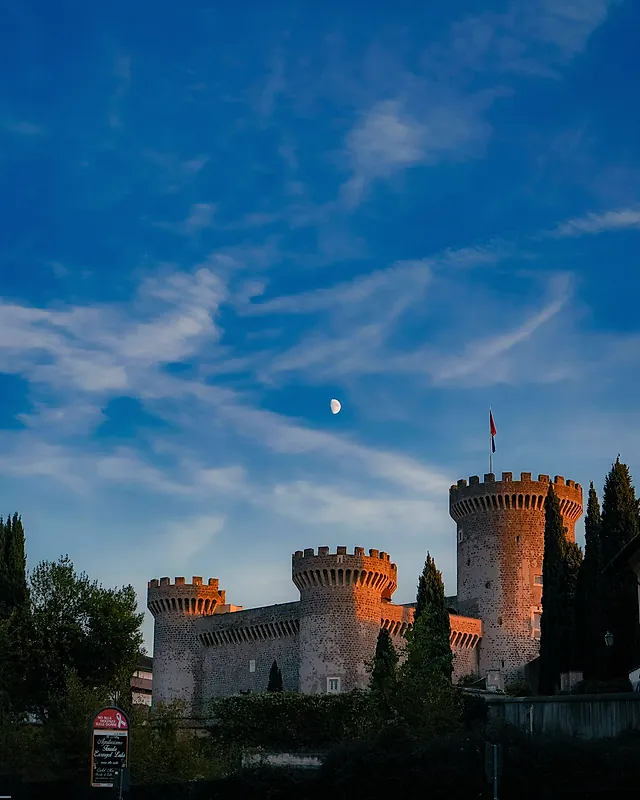 Towers of Tivoli's fortress with the moon